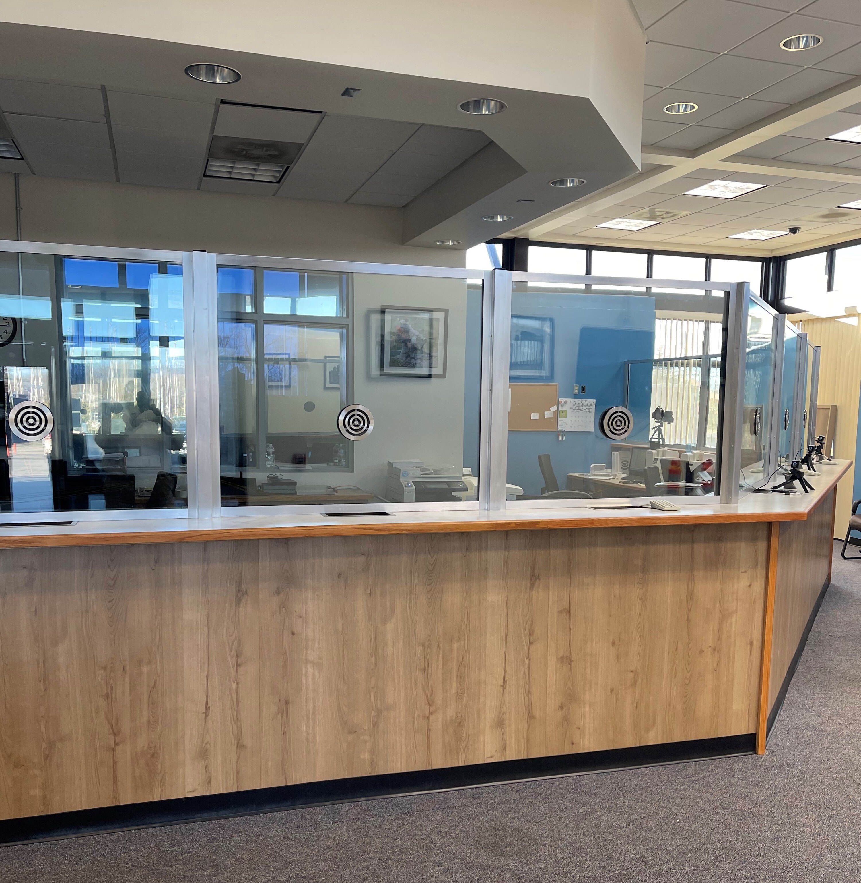 Government reception with walk-through detection and ballistic glazing.