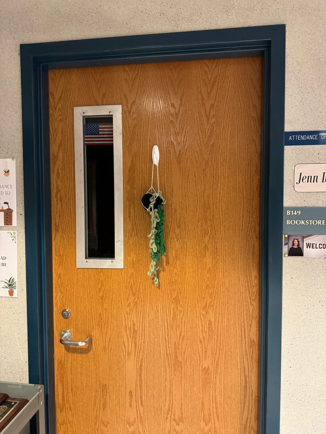 RetroKIT installed in a 30 by 8 inch vision lite on the student bookstore door at an Indiana high school. Original oak door and navy frame retained.