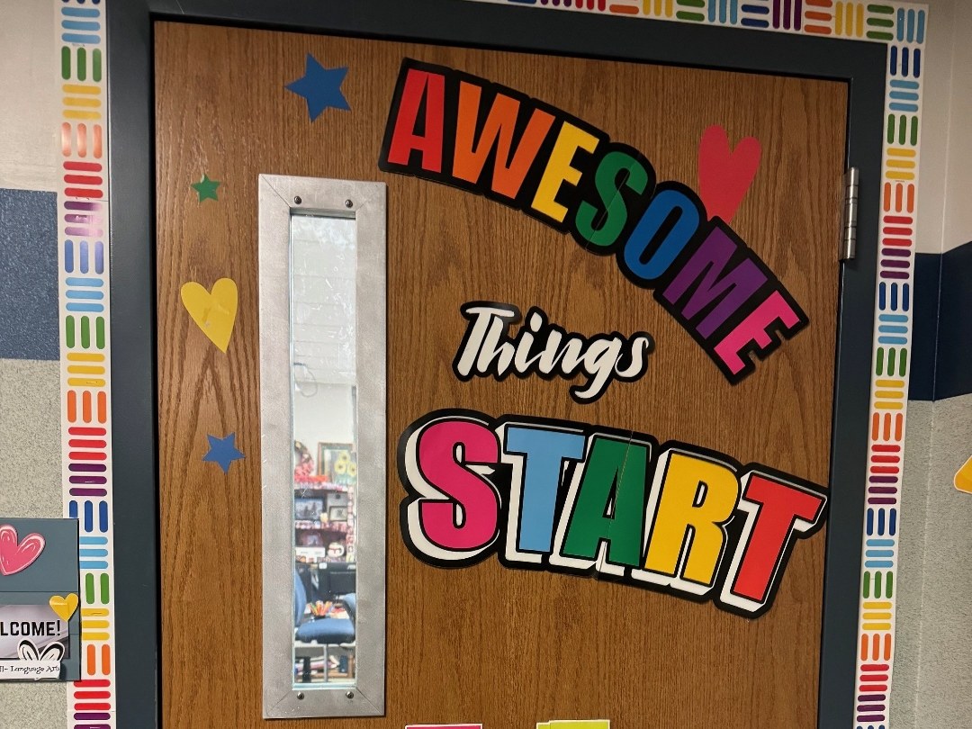 Classroom door at an Indiana high school — a narrow vision lite ready for a RetroKIT panel, the kind of opening this product retrofits room by room.