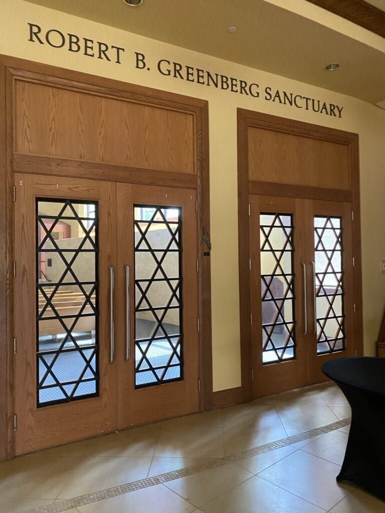 Two Sets Of Doors With Robert B. Greenberg Sanctuary Writing Overhead