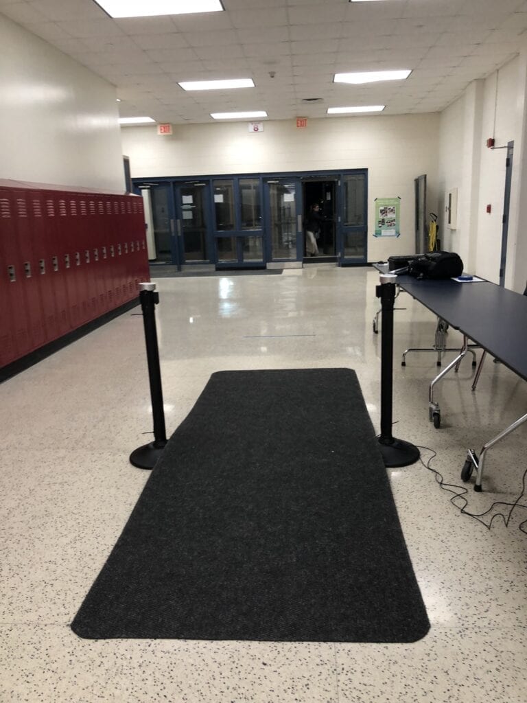 Walk Through Metal Detector In A School Corridor